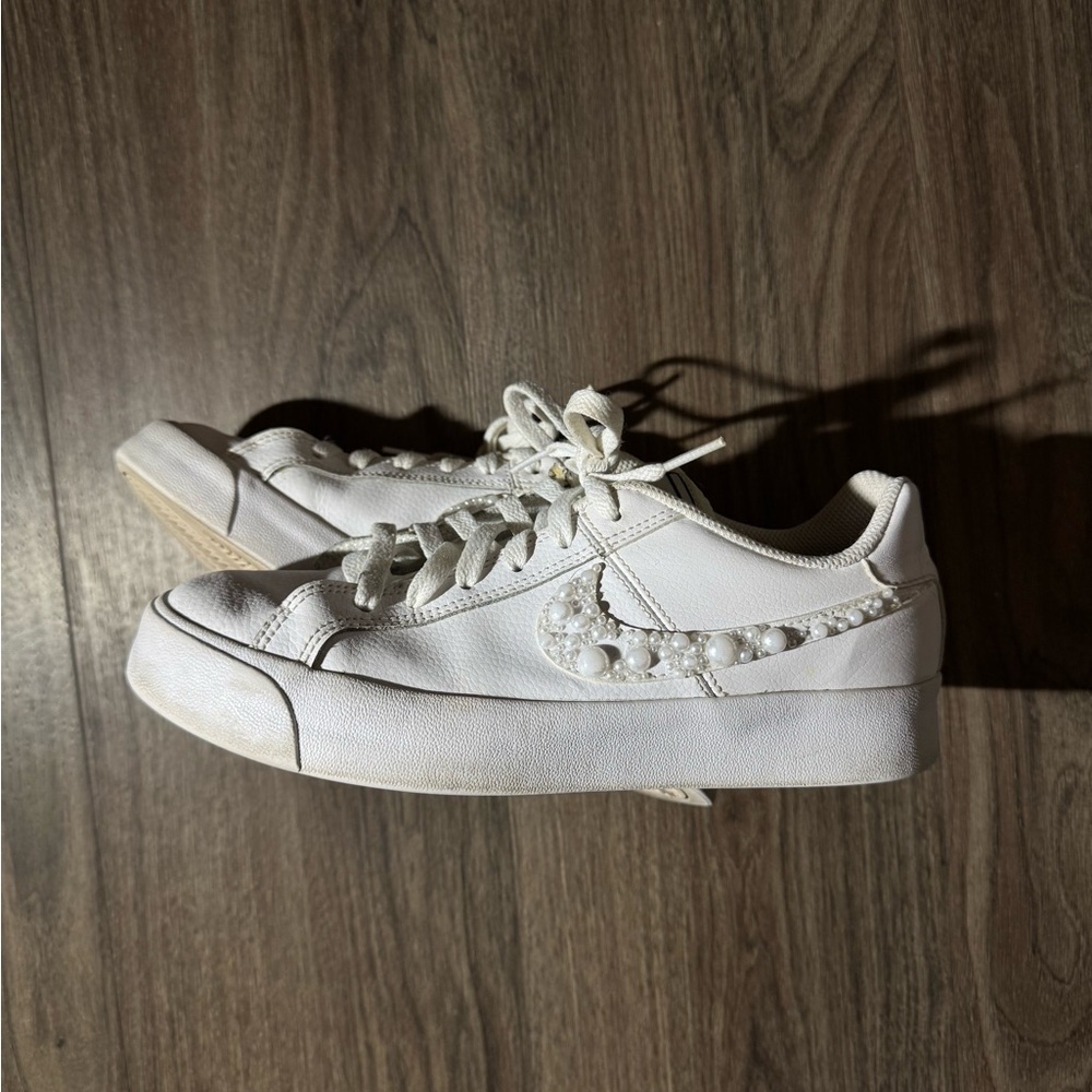 Nike White Low-Top Sneakers with Pearl-Embellished Swoosh
